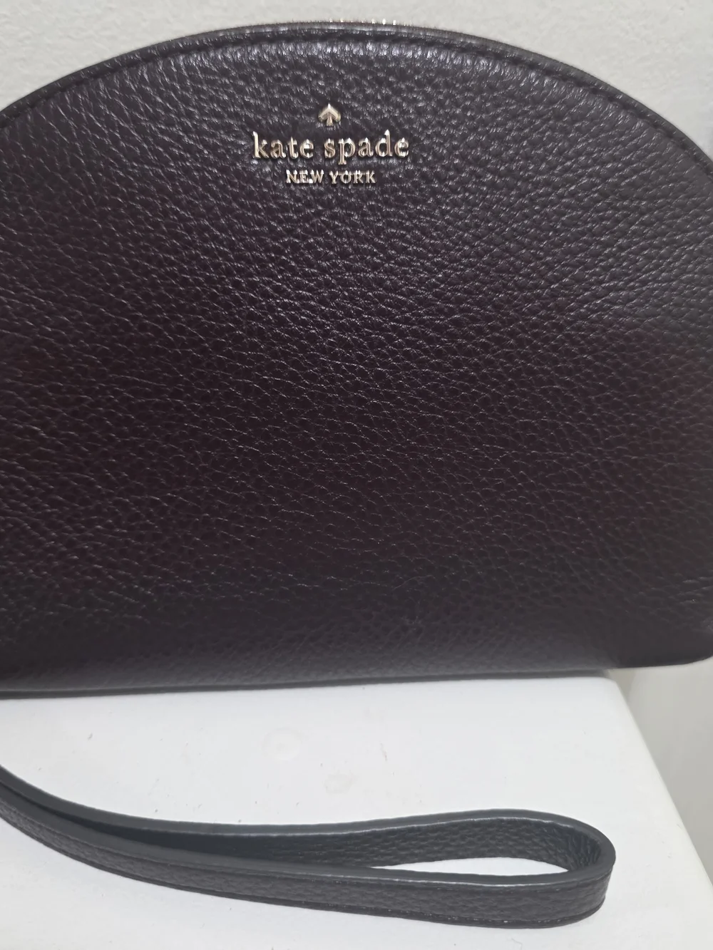 kate spade Pebbled Leather Wristlet in Deep Plum